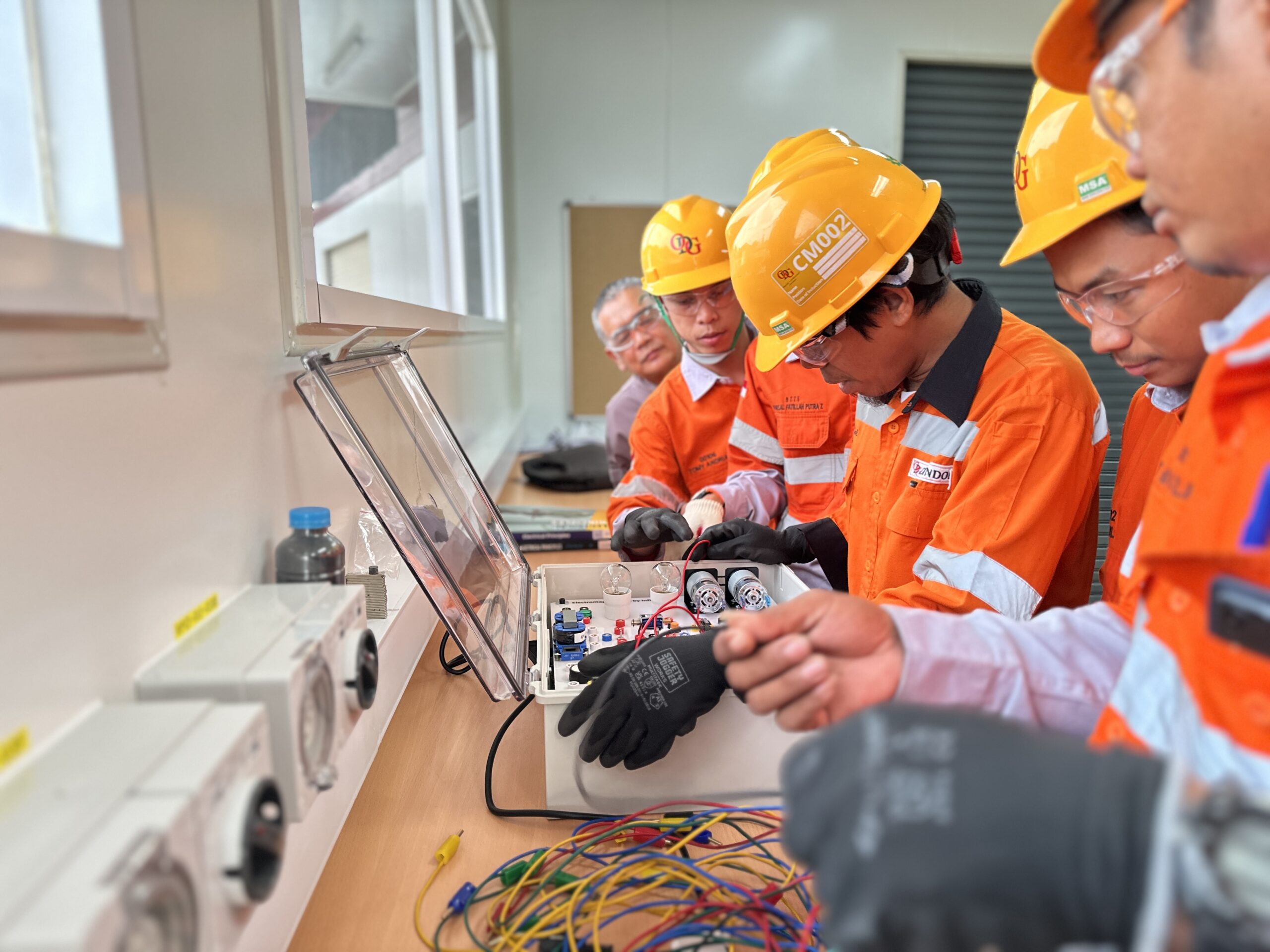 TSDC students learning electrical instrument in class